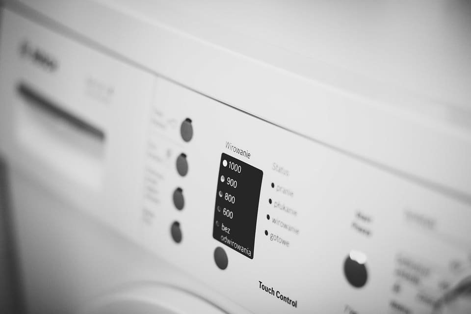 Close-up of a modern front-loading washing machine control panel